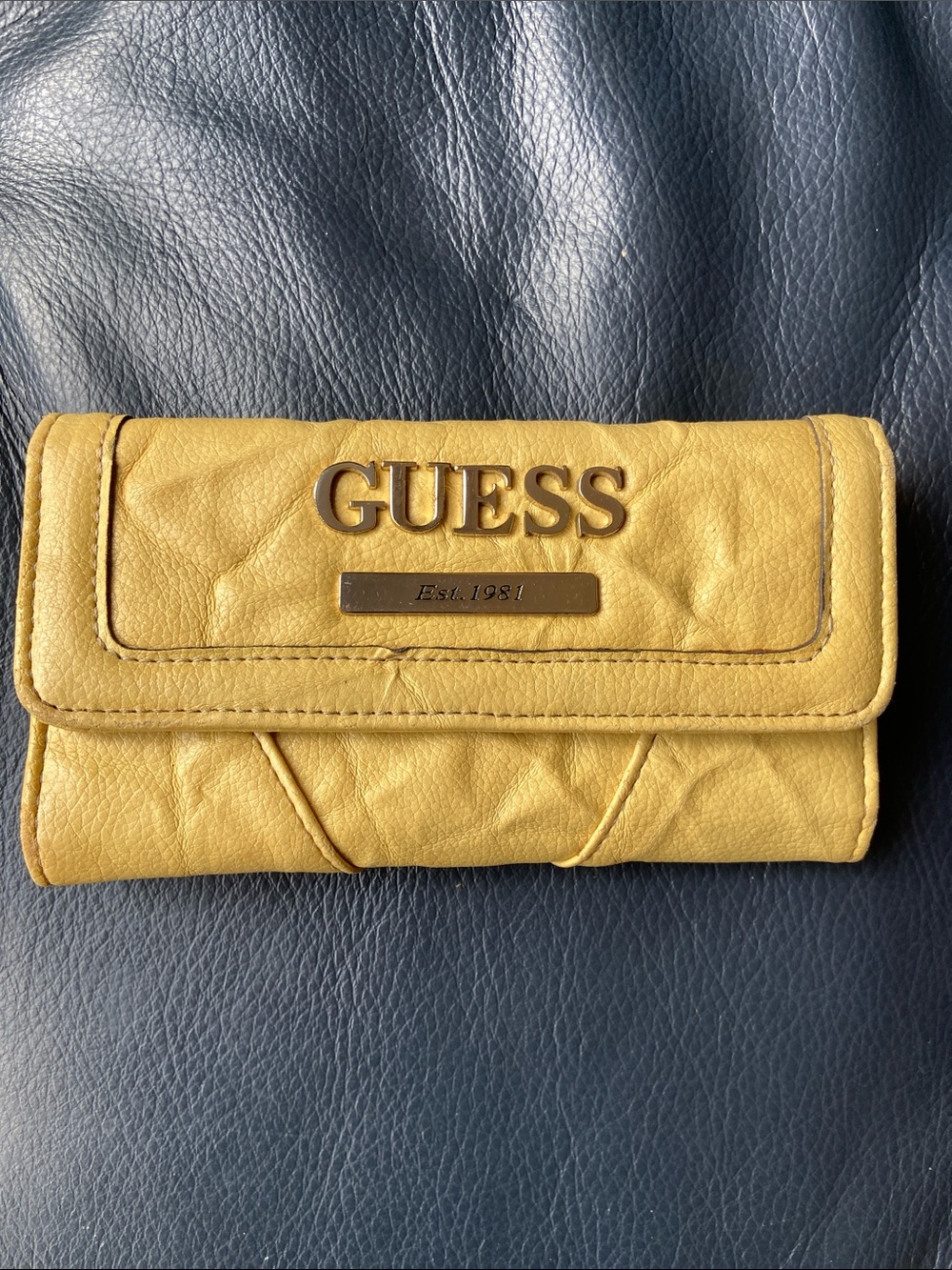 GUESS mustard yellow fold-over quilted wallet with gold logo
